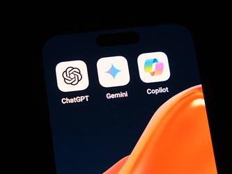 mobile phone showing chaptgpt gemini and copilot icons